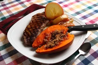 Steak dinner with sweet potato and fried apples