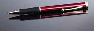 Shiny red ballpoint pen